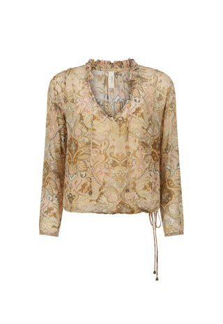 A long-sleeve blouse with a beige and gold paisley pattern, featuring a split V-neckline with tie-front lacing and a drawstring detail at the side hem.