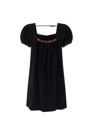 A black short-sleeve dress with puff sleeves and a smocked bodice, featuring a colorful embroidered band around the neckline, shown against a plain white background.
